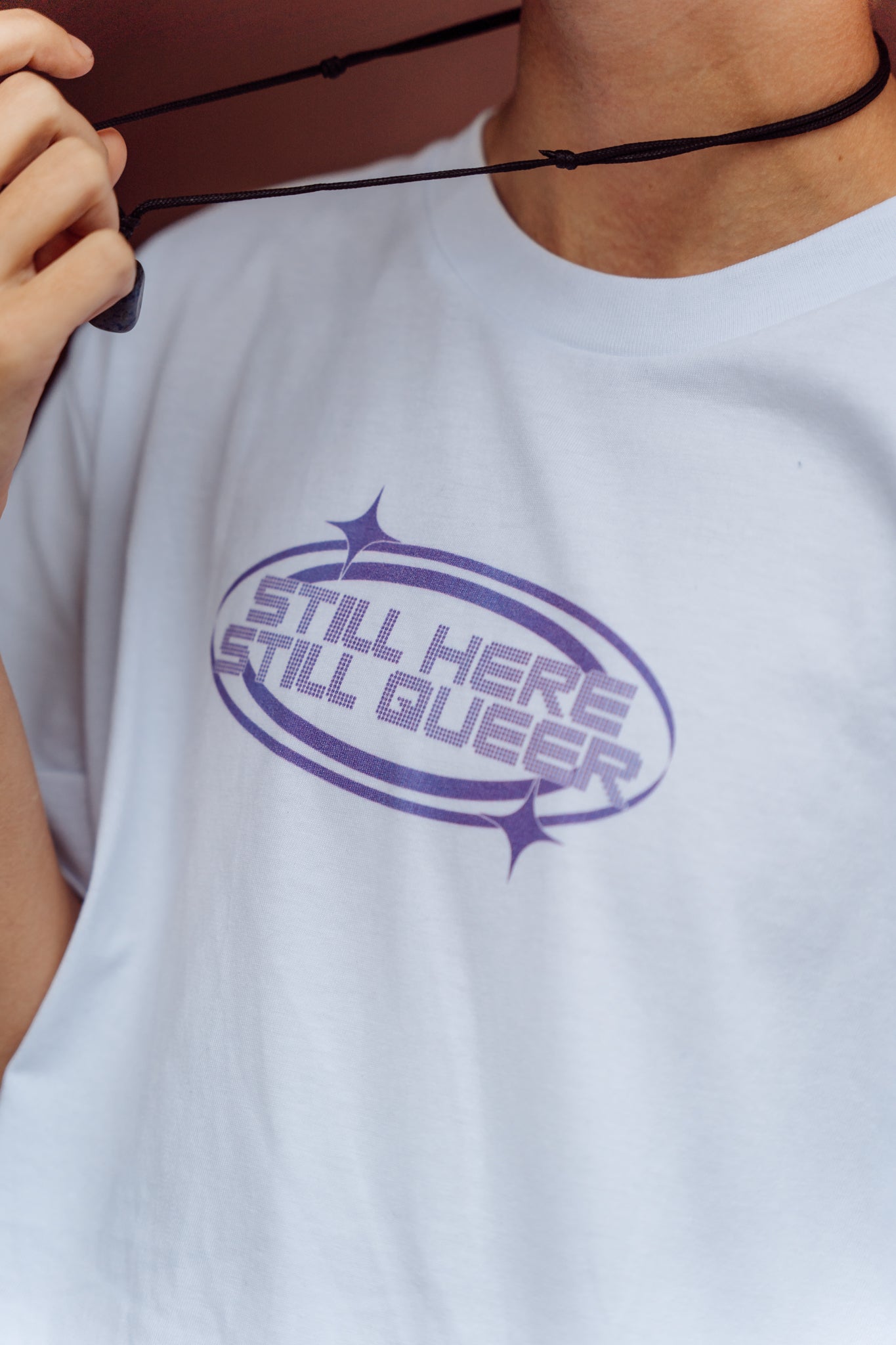 Still Here Still Queer Tee